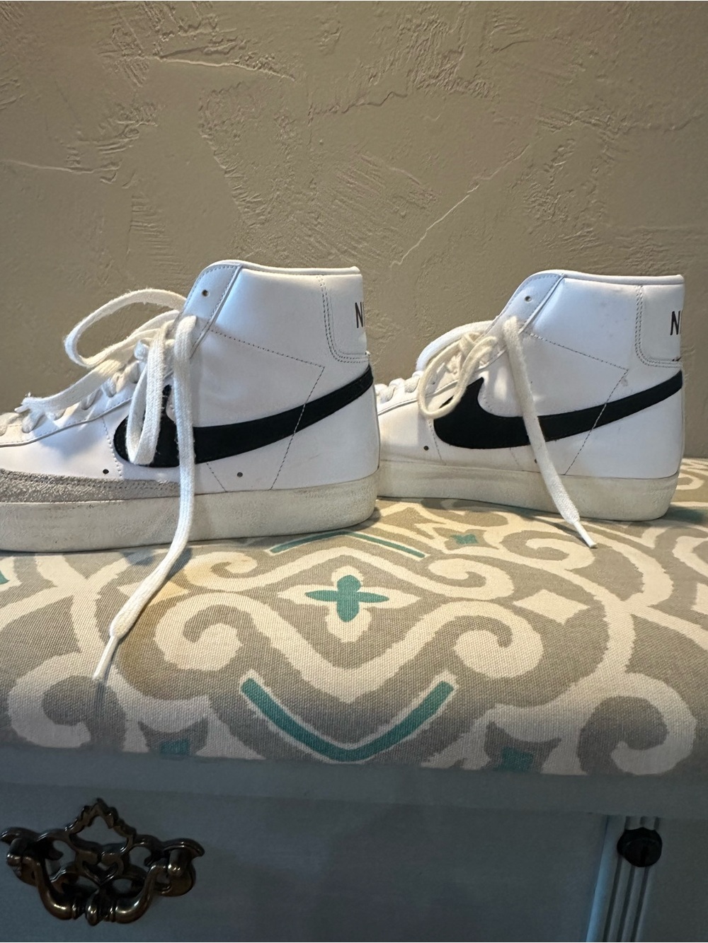 Nike White High-Top Sneakers with Black Swoosh